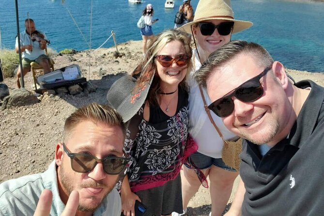 Private Day Trip to Santorini from Athens: Sightseeing Highlights - Perivolos for black sand and a seaside meal