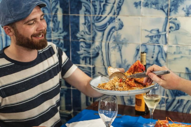 Private Lisbon Food Tour in Baixa with Wine & Local Delights - Rua da Madalena and the serious business of Portuguese food