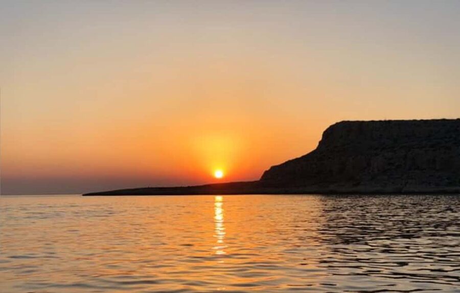 Protaras Blue Lagoon Sunset Tour with Pizza & Champagne - What the boat and guide service mean for you