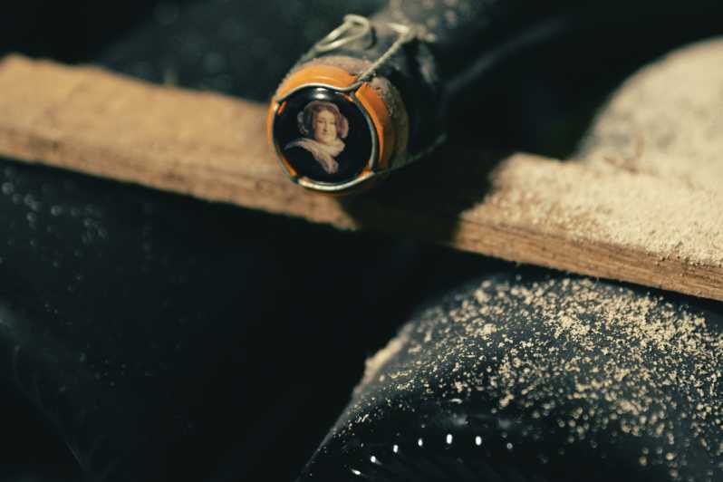 Reims: Veuve Clicquot and Family-Run Winery Day Tour & Lunch - From famous cellars to family bottles