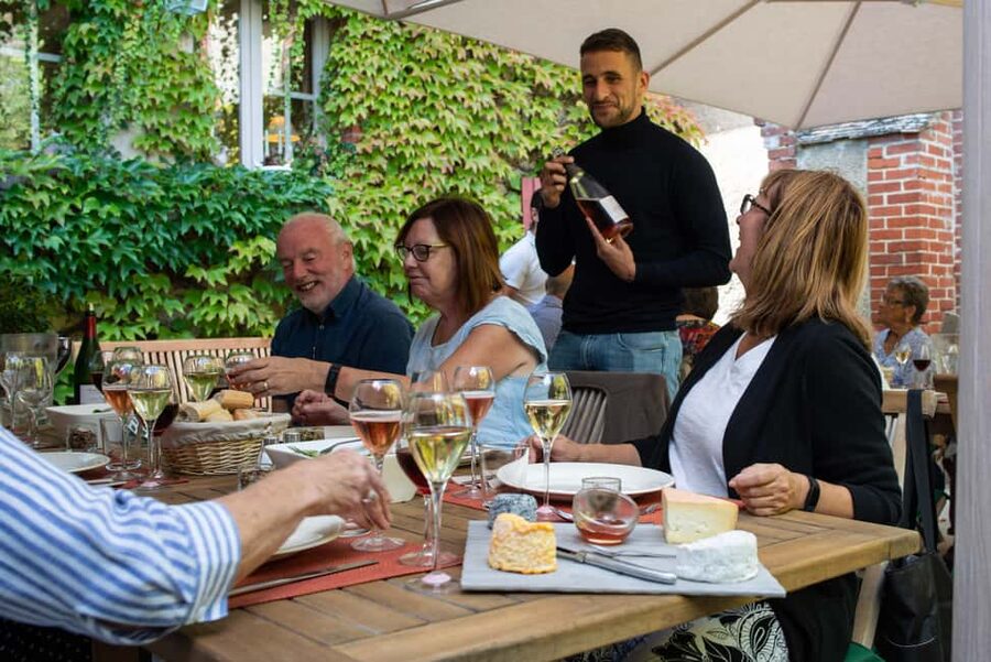Reims: Veuve Clicquot and Family-Run Winery Day Tour & Lunch - Four glasses beneath Veuve Clicquot