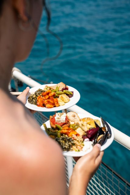 Rhodes: Bay to Bay Swim Cruise with Greek Buffet and Wine - The Greek buffet and what is included