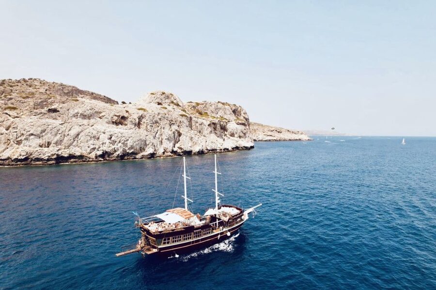 Rhodes: Sunset Cruise with Unlimited Aperol, Beer, and Wine - Leaving Mandraki Harbour in Rhodes