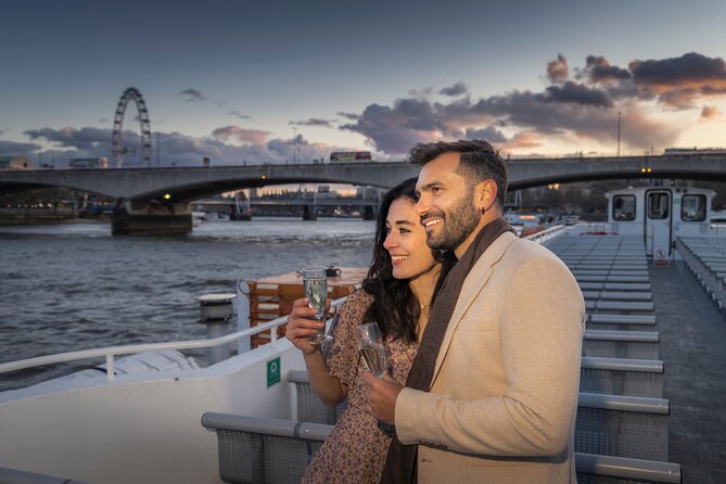 River Thames Evening Cruise with Sparkling wine and Canapés - Westminster, Big Ben, and the London Eye at dusk