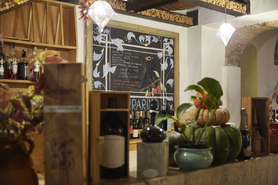 Rome Food Tour: Trastevere Aperitivo, Wine & Pasta Dinner - Bar San Calisto shows another side of local Rome