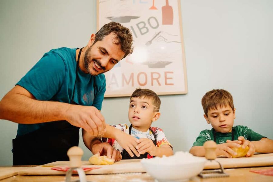 Rome: Fresh Pasta-Making Class with Wine and Gelato - Cooking and sitting down to eat