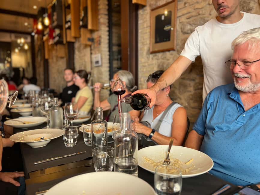 Rome: Gourmet Food Tour with Dinner & Barolo Wine - The guides shape the evening