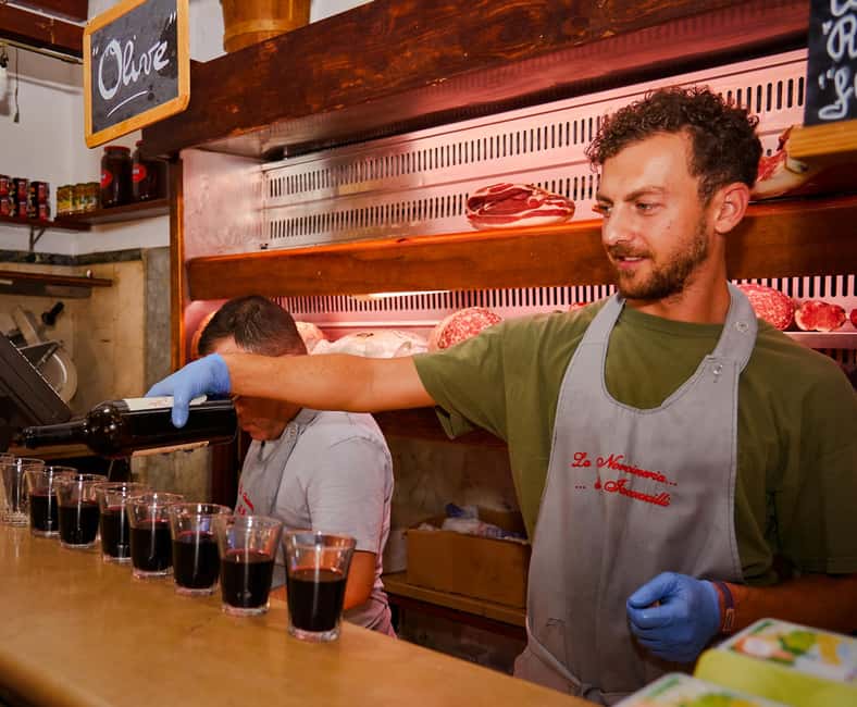 Rome: Guided Food Walking Tour with Wine in Trastevere - The main sit-down stop at Spirito di Vino