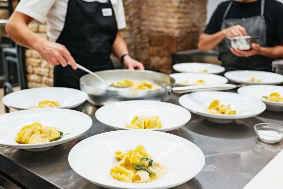 Rome: Hands-On Pasta & Tiramisu Class with Unlimited Wine - Sitting Down to Eat Your Own Work