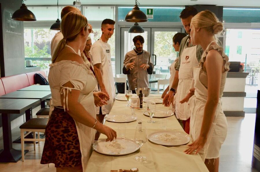 Rome: Hands-On Pizza Making Class near the Vatican with Wine - Mixing and kneading the dough