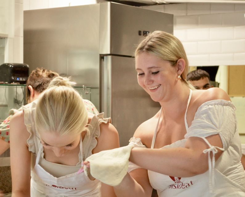 Rome: Hands-On Pizza Making Class near the Vatican with Wine - Stretching, shaping, and choosing toppings