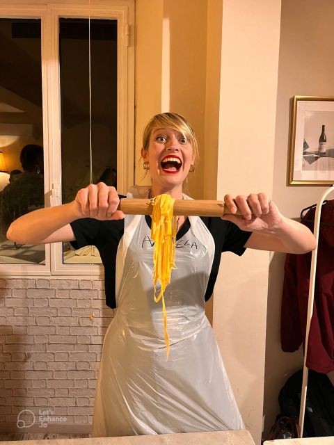 Rome: Pasta Making Class with Wine, Limoncello, and Dessert - Kneading dough with flour and eggs