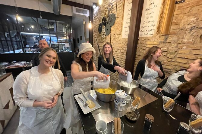 Rome: Pizza & Tiramisu Class with Free Flowing Fine Wine - Shaping a Margherita for the wood-fired oven