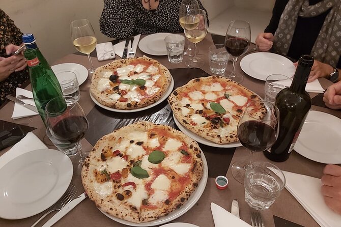 Rome: Pizza & Tiramisu Class with Free Flowing Fine Wine - Price and overall value at $47.16