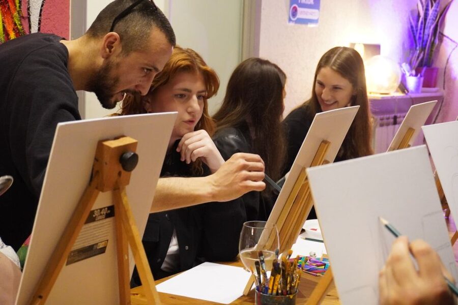 Rome: Wine and Paint Experience in Piazza Navona - Wine, pizza, and the social side of painting