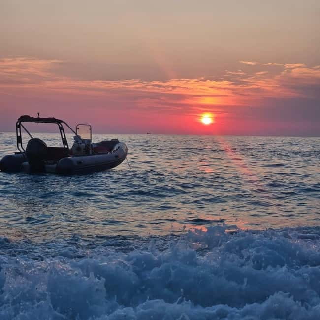 Sarandë: Sunset boat tour with local wine - Aldo, the captain, and the group atmosphere