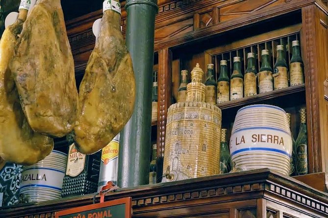 Sevilla Food Tour: Tapas, Wine, History & Traditions - Santa Cruz, family food, and the final sweet bite