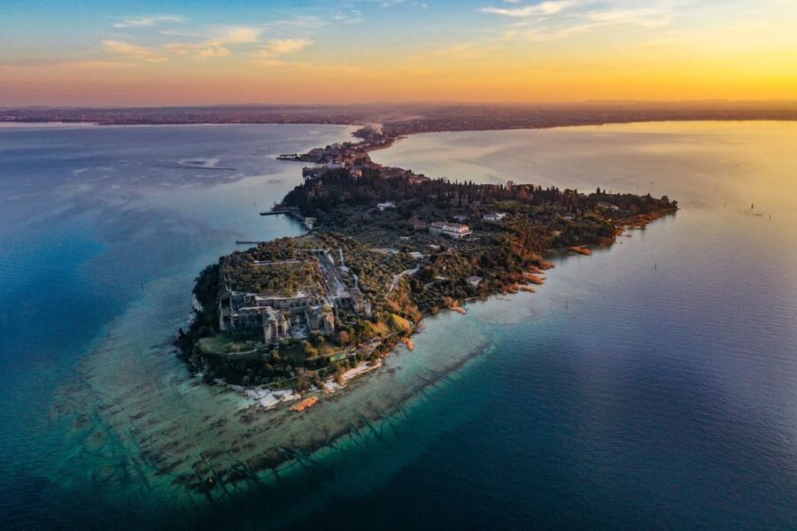 Sirmione: Sunset Boat Cruise with Local Wine - The first views of Sirmione from the water