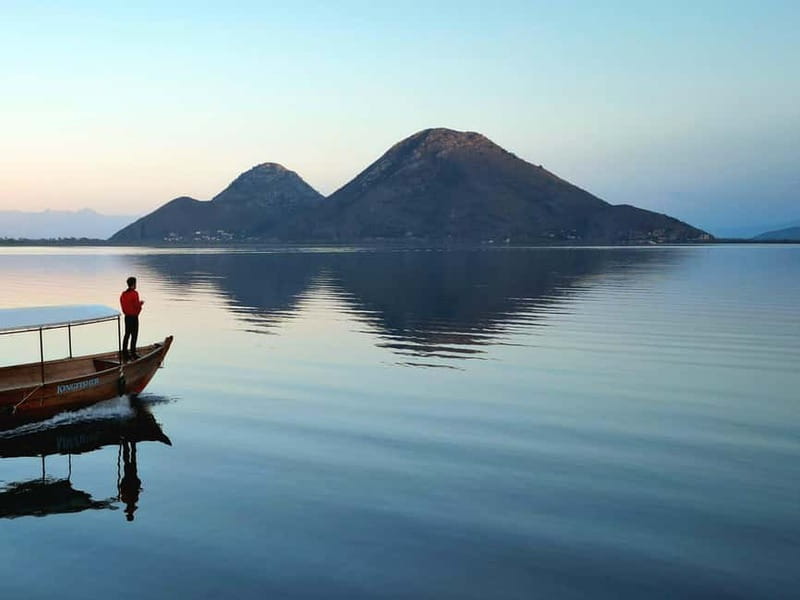 Skadar Lake: Guided Sunset Boat Tour with Wooden Boat & Wine - Parking and finding the right desk in Virpazar
