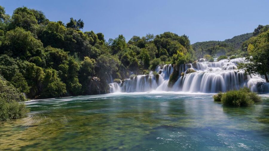 Split: Krka Waterfalls With Boat Cruise, Wine and Olive Oil - Old mills, stone houses, and Europe’s first hydroelectric station