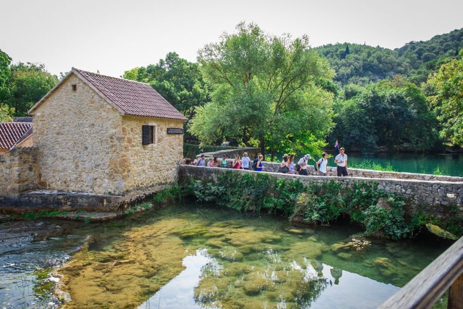 Split/Trogir: Krka National Park Day Trip with Wine Tasting - Entering Krka through Skradinski Buk