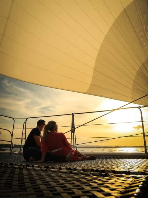 Sunny Beach: Sunset Catamaran Cruise with Dinner & Prosecco - From Sunny Beach to the harbor by red London bus