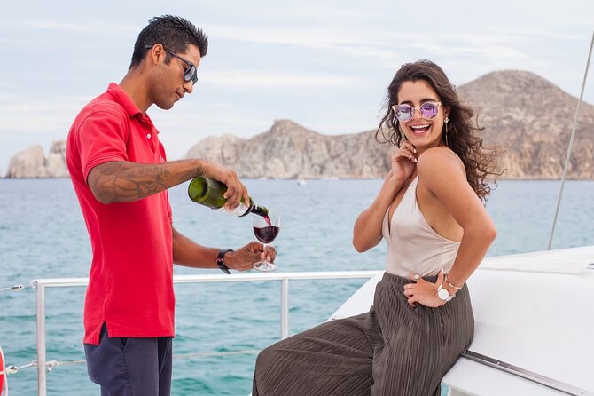 Sunset Cruise in Los Cabos with Jazz and Wine - Jazz music, cocktails, and a proper snack table