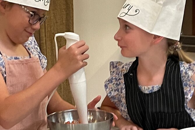 Super Fun Pasta & Gelato Class by Vatican with Wine + Oil Tasting - Making pasta by hand with a rolling pin