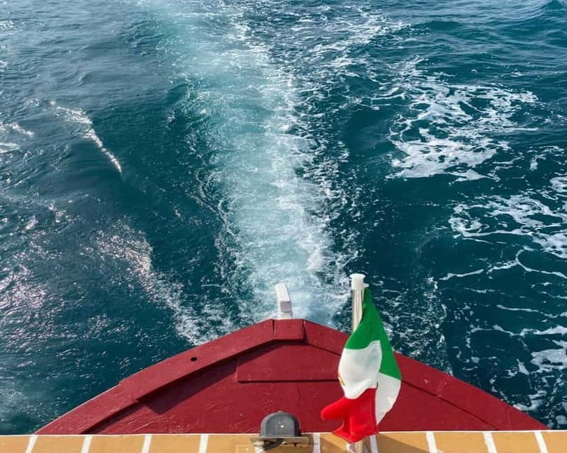 Syracuse: Boat Trip with Lunch, Wine, and Swimming Stops - A Sicilian lunch served on board