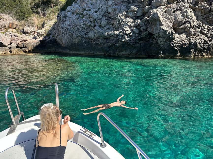 Taormina: Boat Tour with Sicilian Wine Tasting - Cruising Taormina’s bays and caves