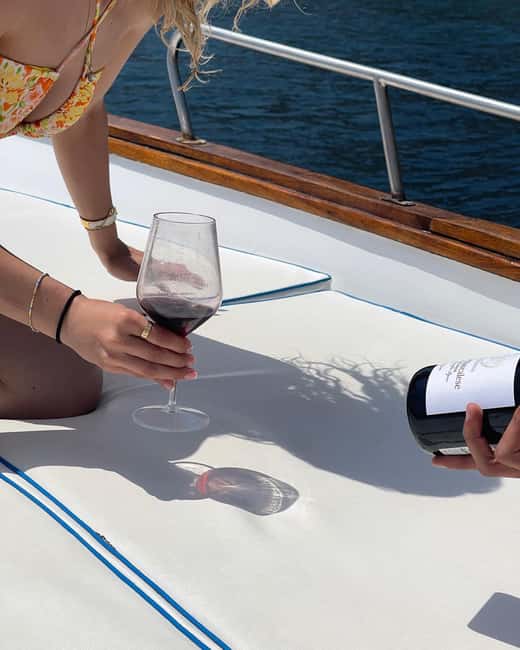 Taormina: Boat Tour with Sicilian Wine Tasting - The guides shape the experience