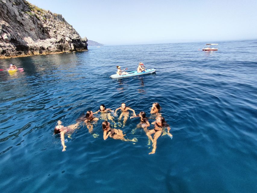 Taormina: Coastal Highlights Cruise with Wine & Food Tasting - Swimming and snorkeling in clear water