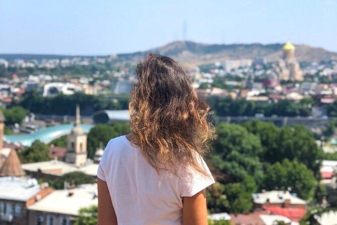Tbilisi:Evening Walking & Talking Tour with Wine & Boat Ride - Freedom Square and the old city’s clock tower
