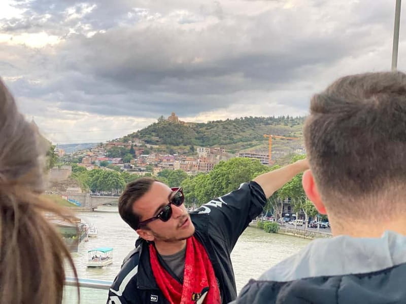 Tbilisi: Evening Walking Tour with Wine & Boat Ride Options - The guides and the tone of the evening
