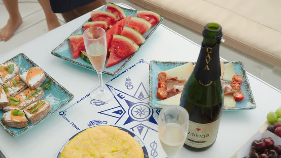 Tenerife: Shared Yacht Cruise with Champagne and Tapas - La Caleta brings the swimming and water sports