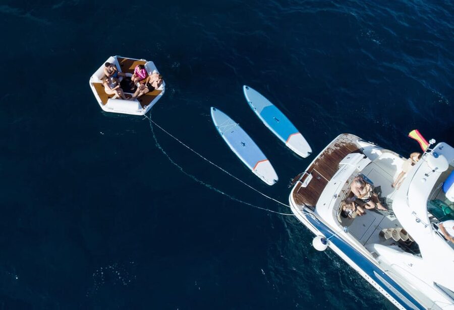 Tenerife: Shared Yacht Cruise with Champagne and Tapas - Boarding at Puerto Colon with champagne in hand