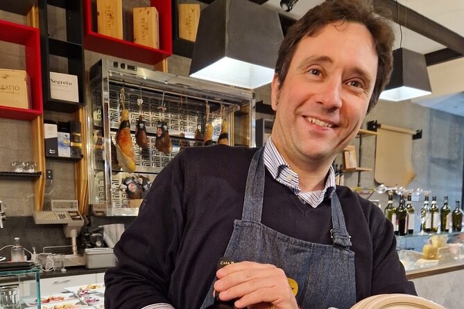 Verona: Pasta and Tiramisu Cooking Class With Free Flowing Wine - Making pasta in a Verona restaurant