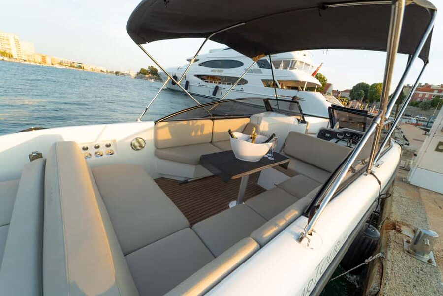 Zadar: Sunset and Night Cruise with Unlimited Sparkling Wine - Bridge lights and Jazine Bay