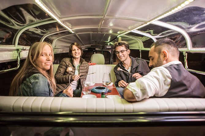Zurich eTukTuk Private Tour - with Cheese Fondue and Wine - A Moving Swiss Supper in Central Zurich