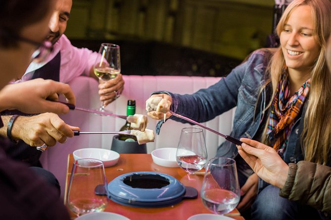 Zurich eTukTuk Private Tour - with Cheese Fondue and Wine - Bahnhofstrasse and the Center of Zurich